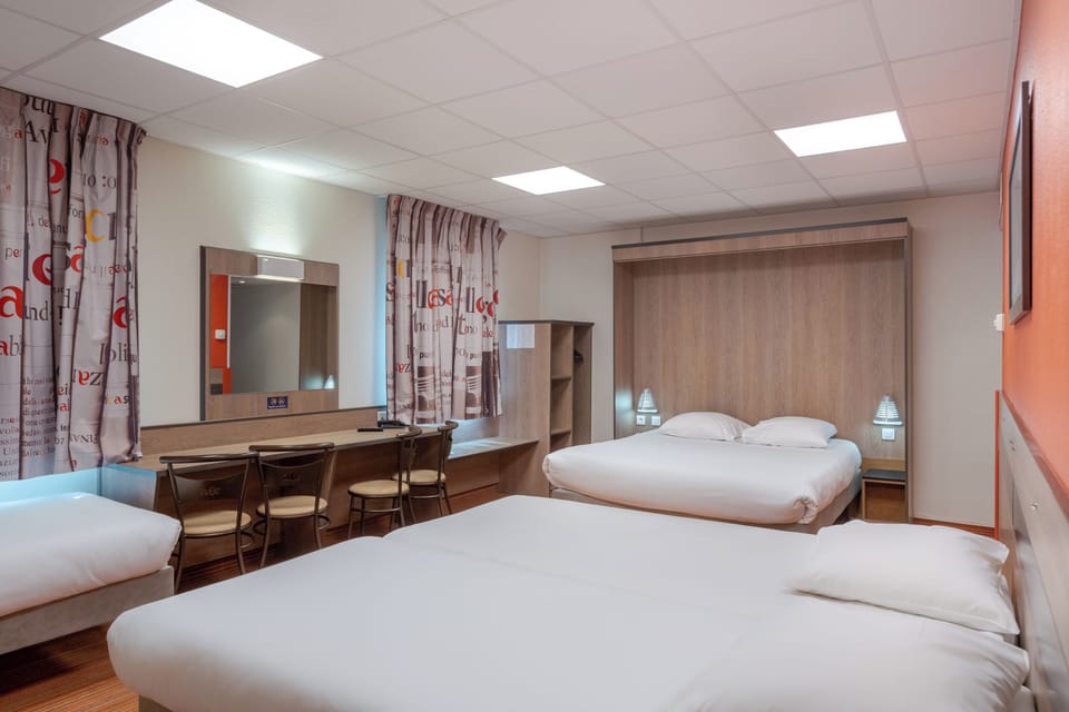 Quadruple Room | Premium bedding, desk, soundproofing, iron/ironing board