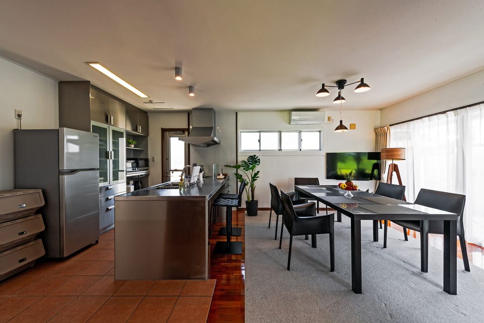 Villa | Living area | 40-inch flat-screen TV with digital channels