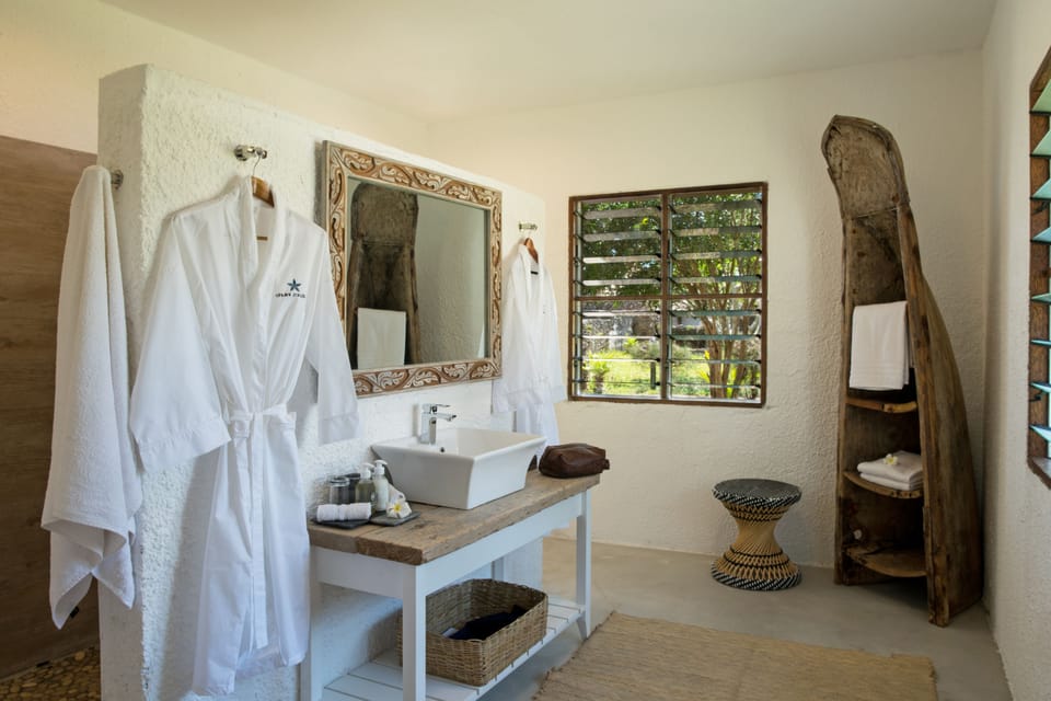 Shower, free toiletries, hair dryer, bathrobes