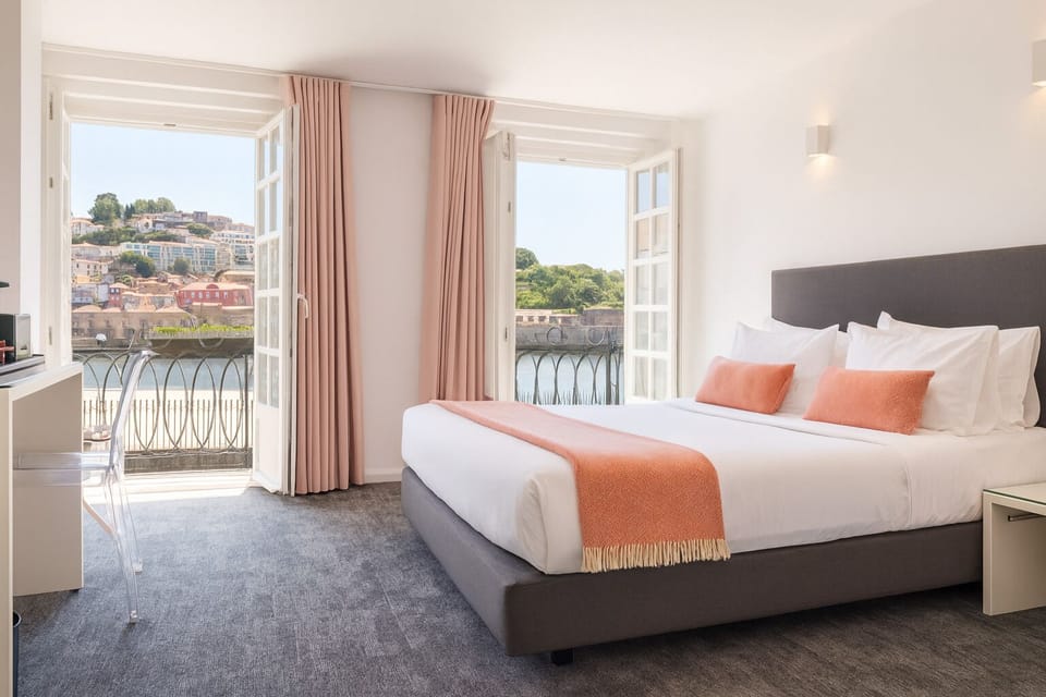 Premium Double Room, Balcony, River View | Individually decorated, individually furnished, blackout drapes