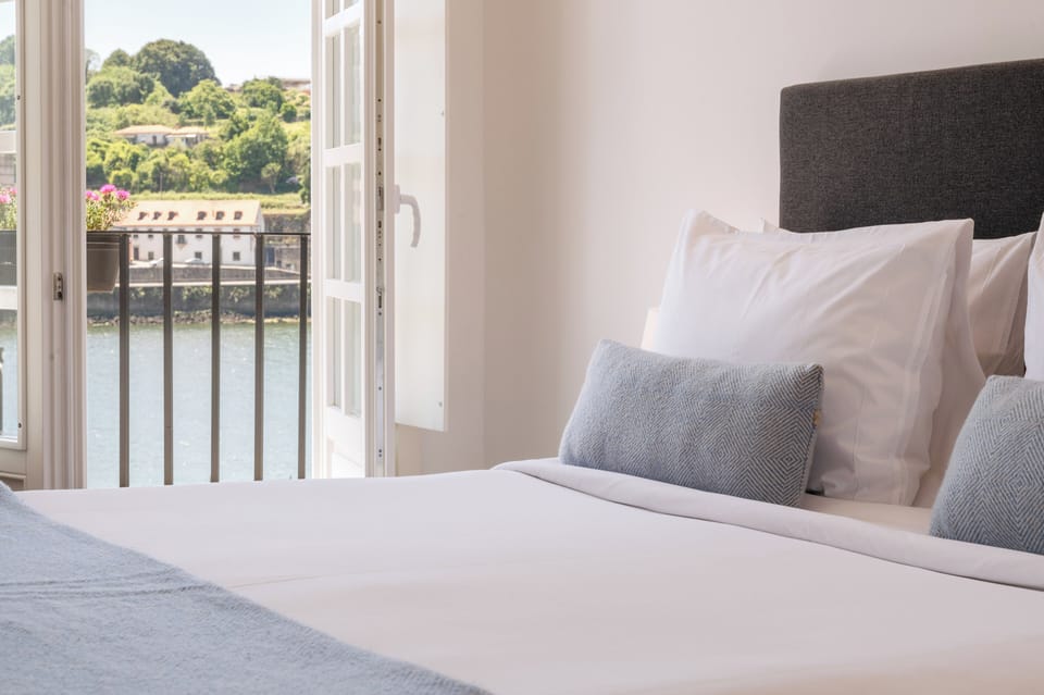 Deluxe Double Room, Balcony, River View | Individually decorated, individually furnished, blackout drapes
