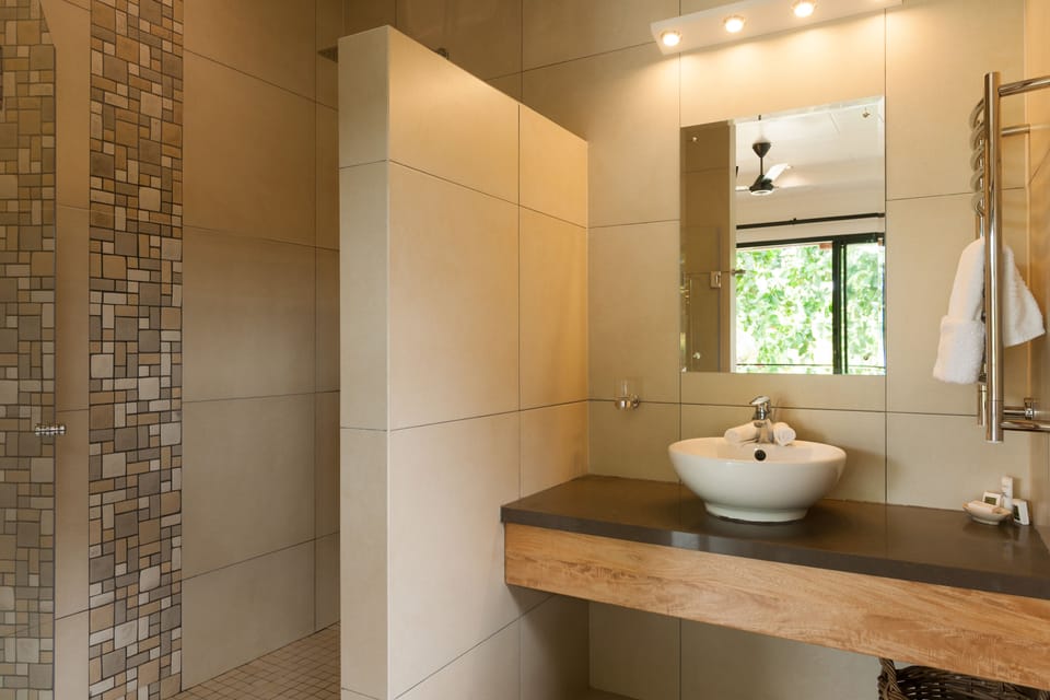 Shower, free toiletries, hair dryer, slippers