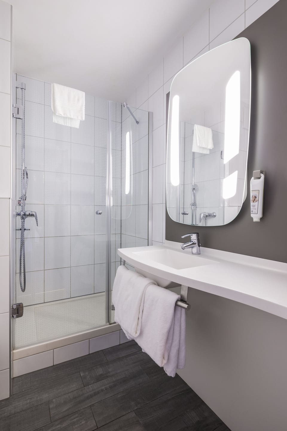 Shower, eco-friendly toiletries, hair dryer, towels