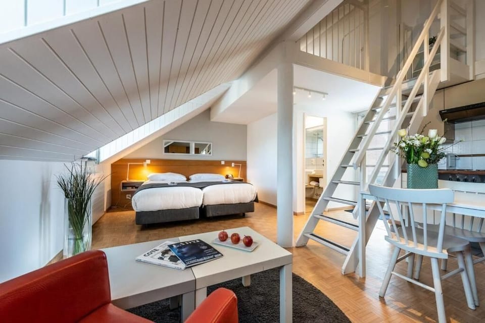 Junior Suite, Terrace | In-room safe, desk, laptop workspace, blackout drapes