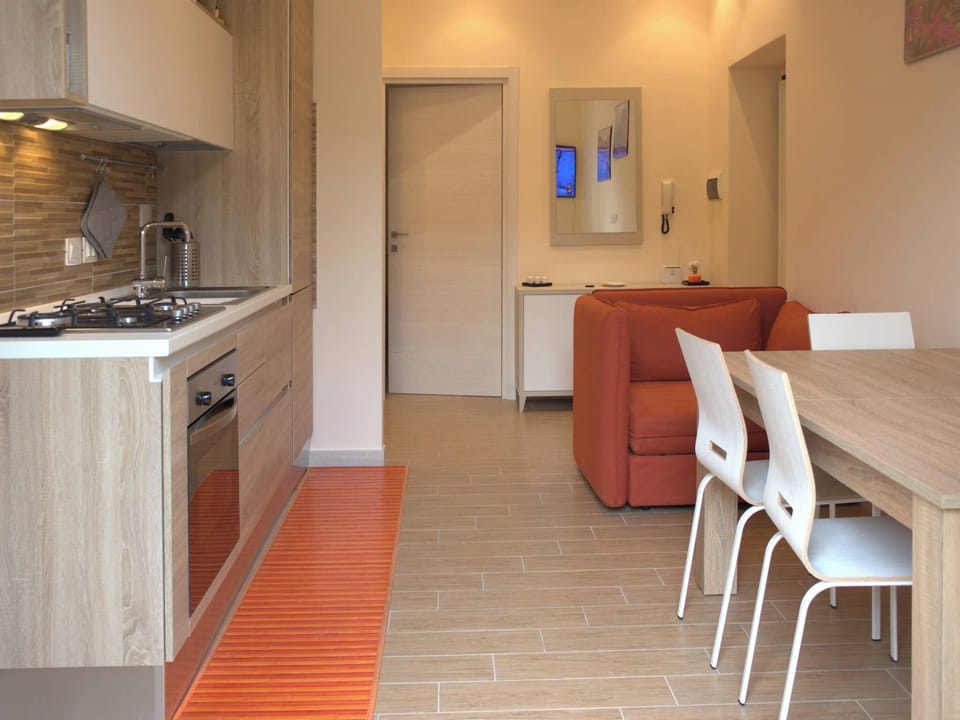 Apartment, 2 Bedrooms, Smoking, Balcony | Living area | Books