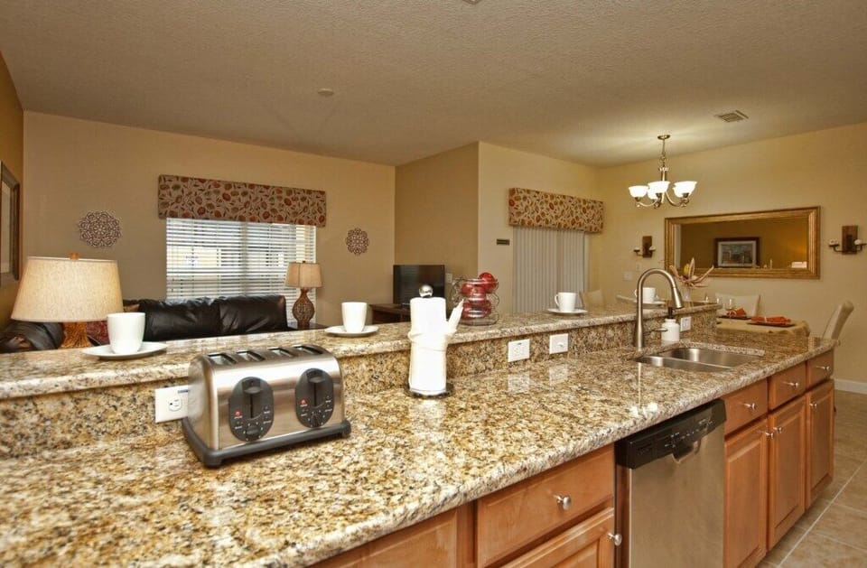 Townhome, 4 Bedrooms | Private kitchen | Fridge, microwave, stovetop, dishwasher