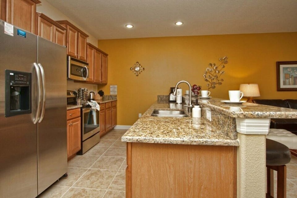 Townhome, 4 Bedrooms | Private kitchen | Fridge, microwave, stovetop, dishwasher