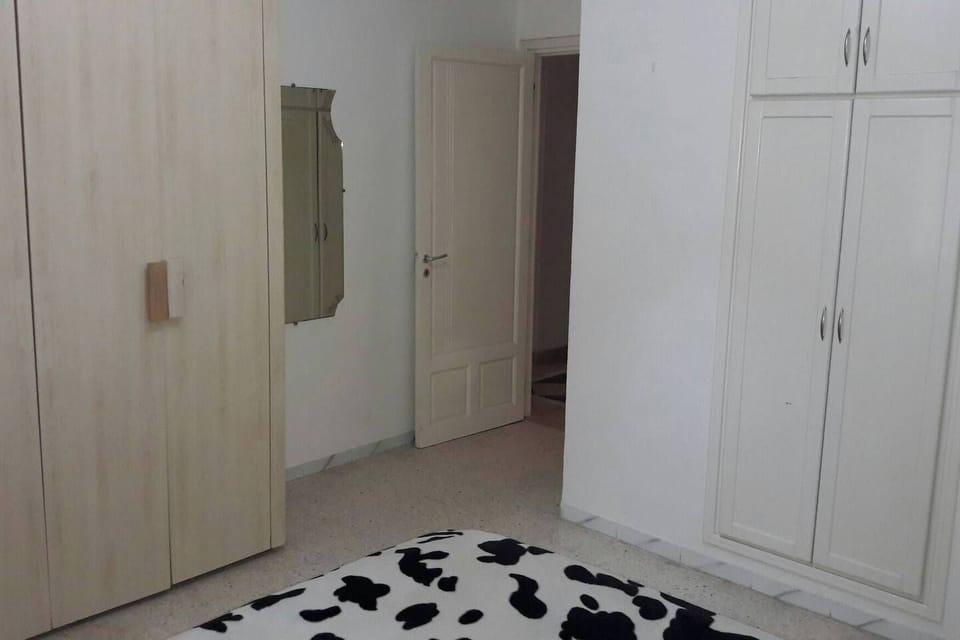 Apartment, 3 Bedrooms, Smoking, Balcony | 4 bedrooms, iron/ironing board