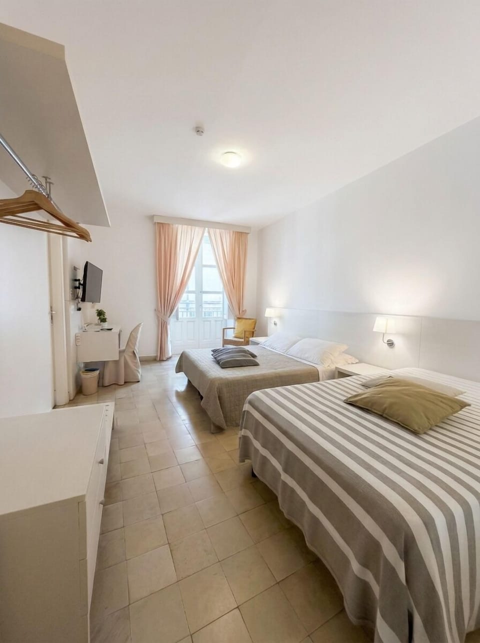 Triple Room, Balcony, Partial Sea View | Down comforters, minibar, desk, free WiFi