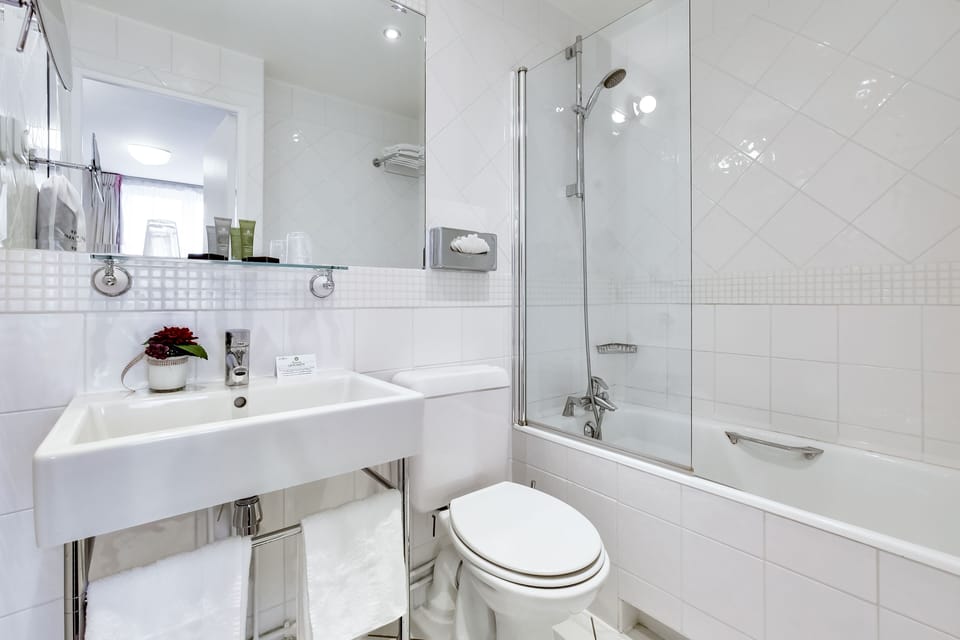 Family Room ( 2 Rooms) - Complimentary soft minibar,courtesy tray, Chromecast and digital press | Bathroom | Combined shower/tub, free toiletries, hair dryer, towels