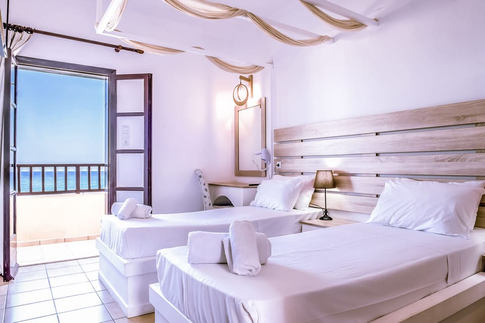 Family Room, Sea View | In-room safe, soundproofing, iron/ironing board, free WiFi