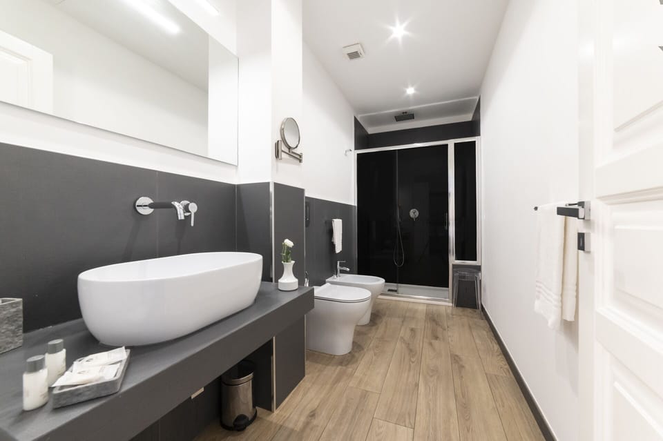 Deluxe Quadruple Room | Premium bedding, down comforters, memory foam beds, minibar