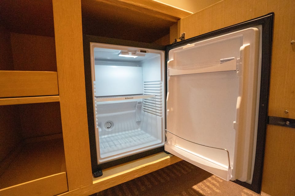 Premium Room, 1 King Bed | In-room safe, desk, laptop workspace, blackout drapes