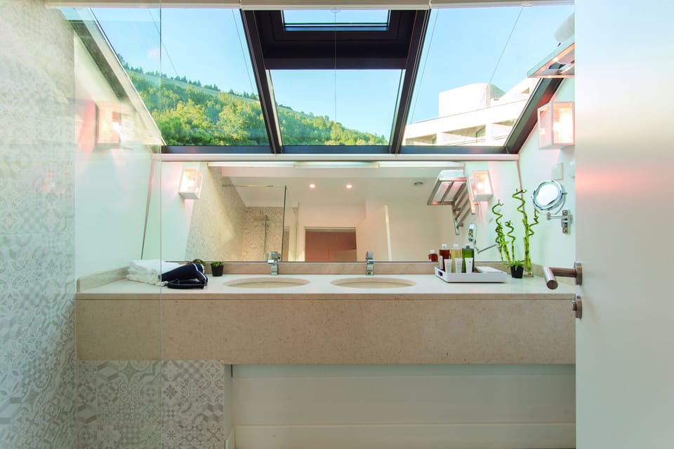 Premium Suite, 2 Bedrooms, Pool View (Balcony) | Bathroom | Shower, rainfall showerhead, free toiletries, hair dryer