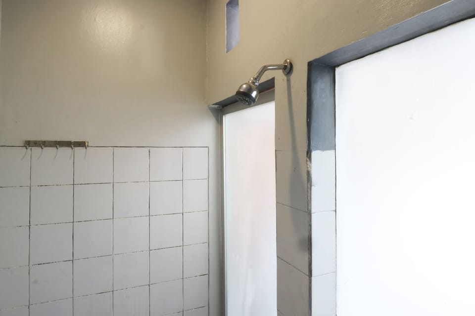 Melati Room | Bathroom | Shower, rainfall showerhead, free toiletries, towels