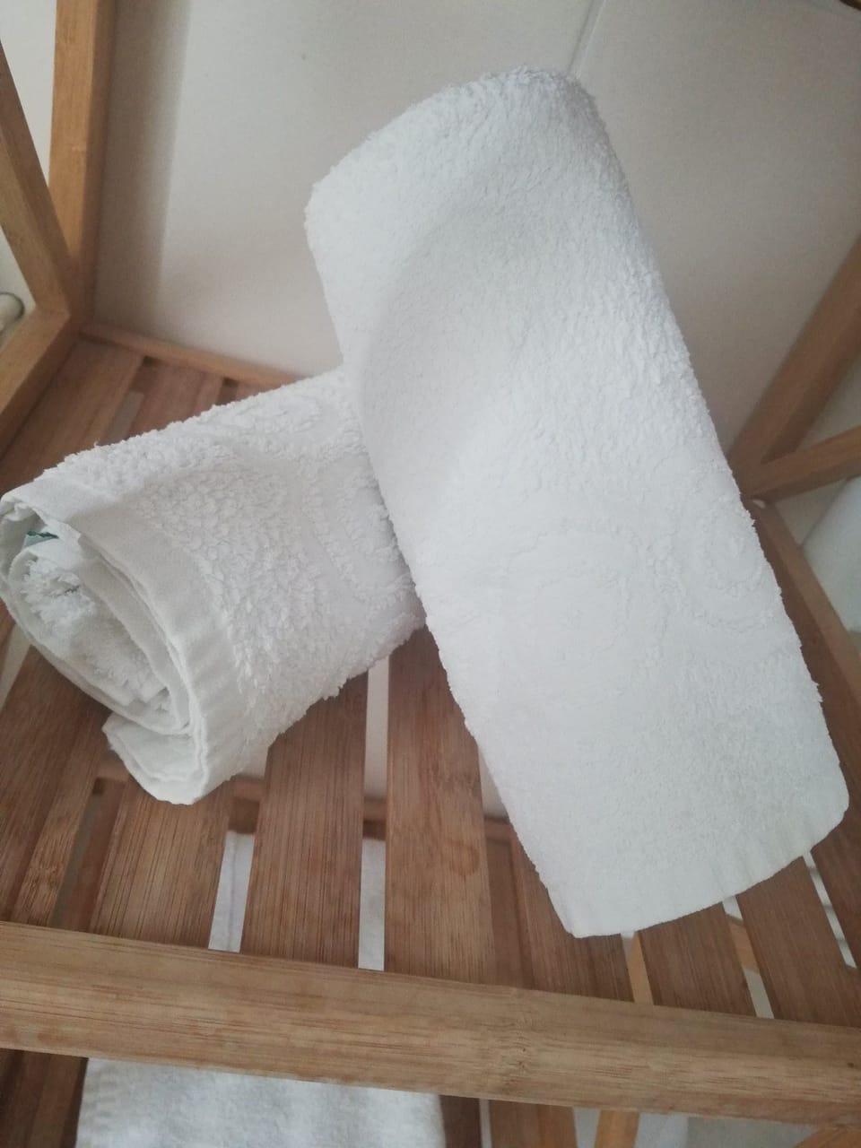 Hair dryer, slippers, towels, soap