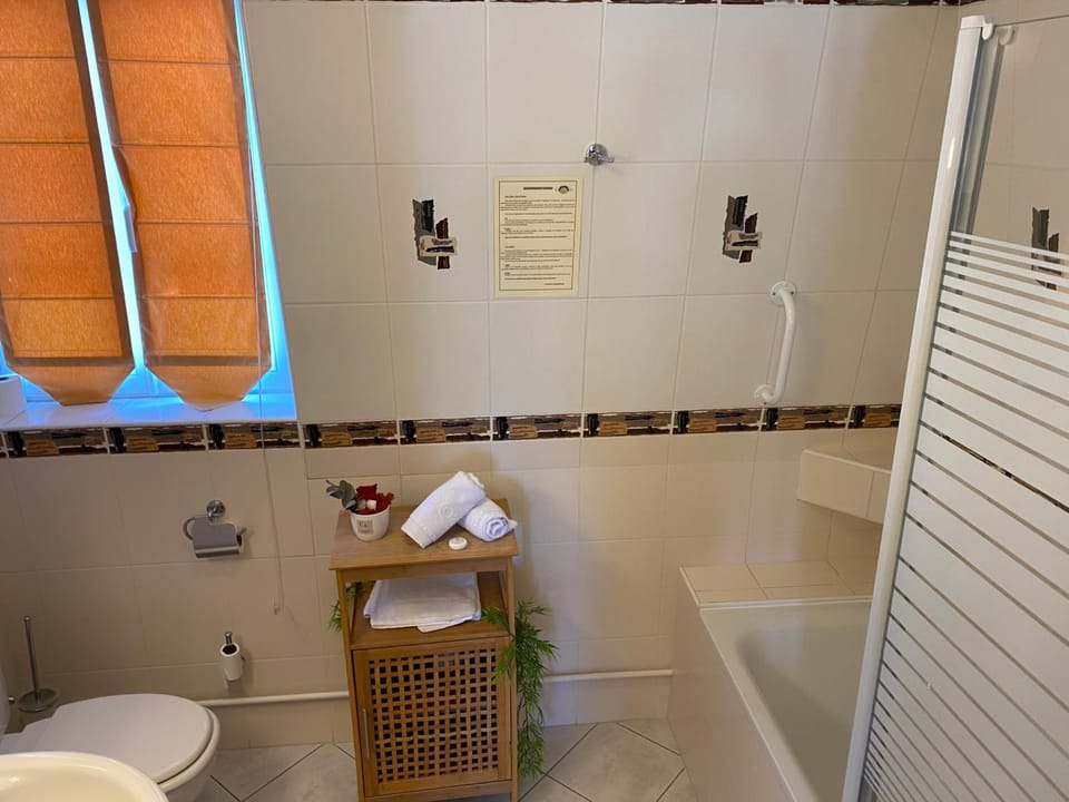 Hair dryer, slippers, towels, soap