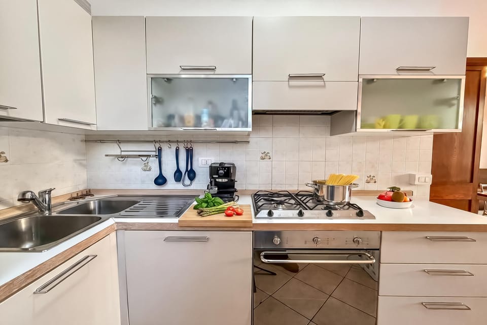 Family Studio, Balcony, Mountain View (Residenza Menaggio - Mimosa) | Private kitchen | Coffee/tea maker, microwave, oven, stovetop