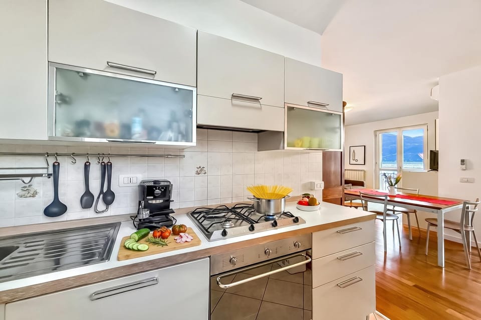 Family Studio, Balcony, Mountain View (Residenza Menaggio - Mimosa) | Private kitchen | Coffee/tea maker, microwave, oven, stovetop