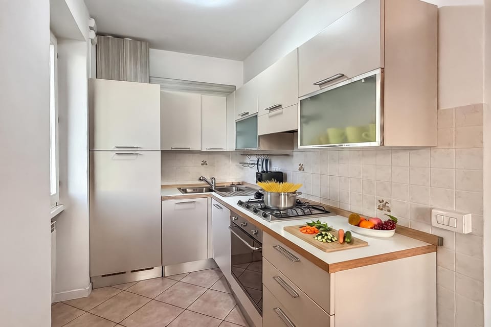Family Studio, Balcony, Mountain View (Residenza Menaggio - Mimosa) | Private kitchen | Coffee/tea maker, microwave, oven, stovetop