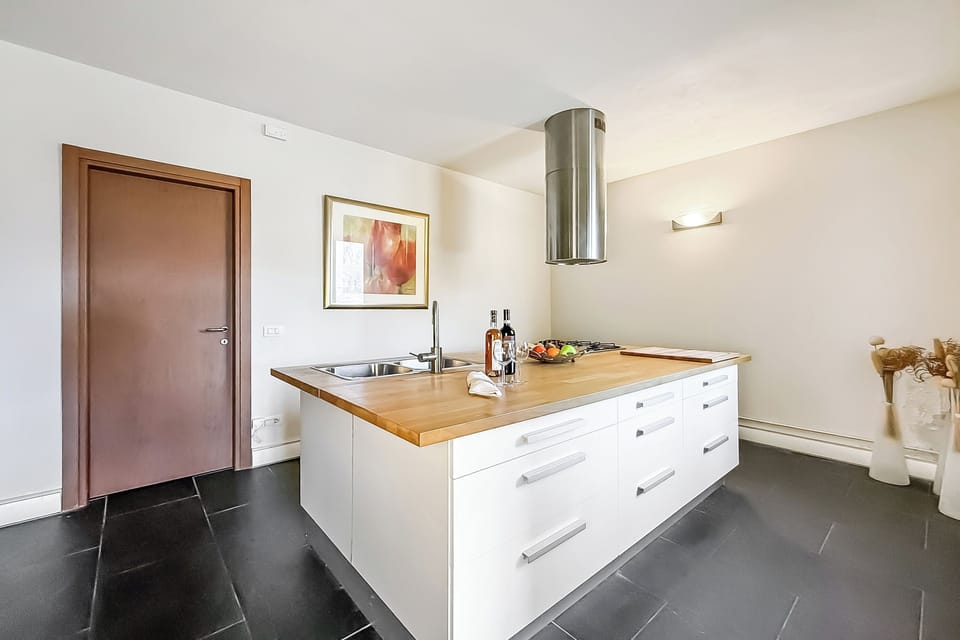 Family Apartment, 5 Bedrooms, Microwave, Mountainside (Casa Tulipano Grande) | Private kitchen | Coffee/tea maker, microwave, oven, stovetop
