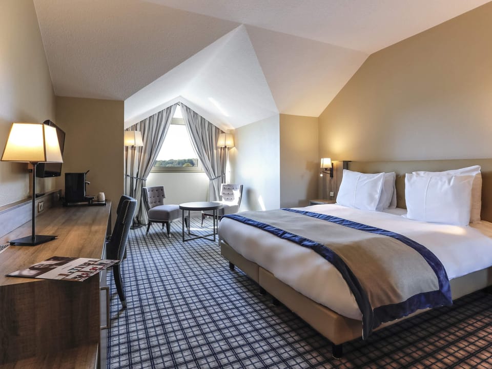 Deluxe Double Room, 1 Double Bed, Golf View | In-room safe, desk, laptop workspace, blackout drapes