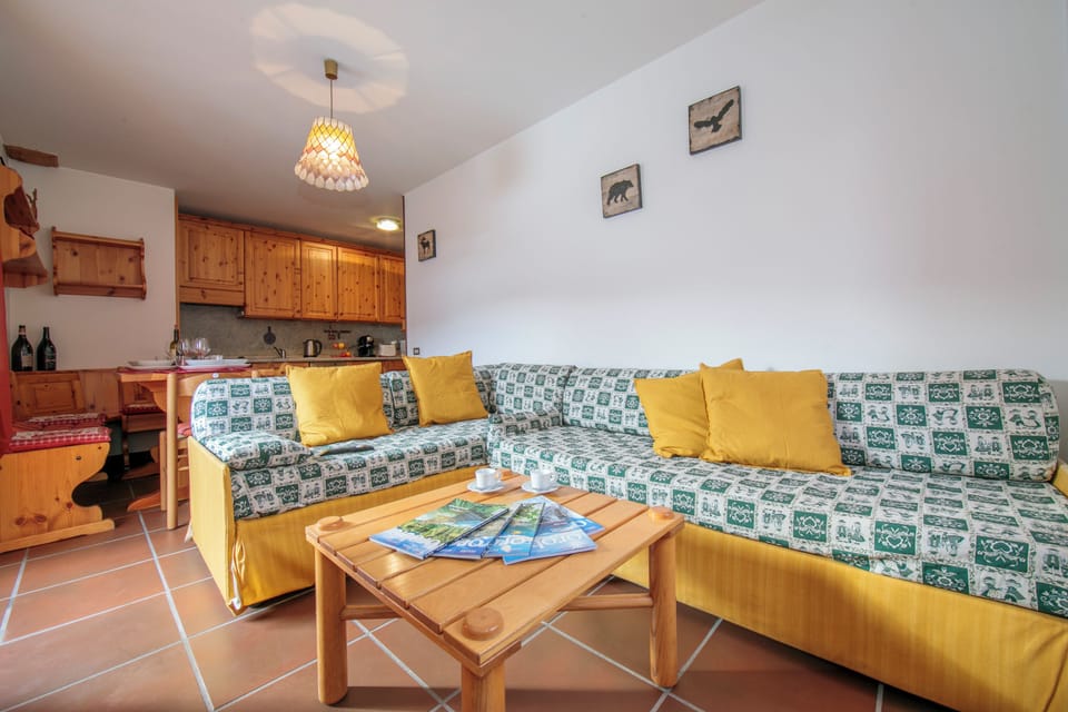 Family Apartment, 2 Bedrooms, 2 Bathrooms (Martina Ski in - Ski out 50m) | Living area | 24-inch flat-screen TV with satellite channels, TV