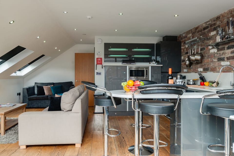 Penthouse, 2 Bedrooms (Sleeps 6, with Sofa Bed) | Living area | LCD TV