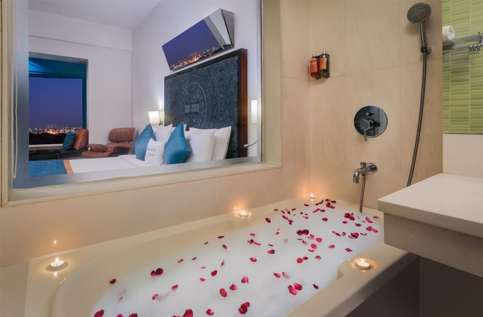 Deluxe Room, 1 King Bed, Garden View | Premium bedding, minibar, in-room safe, individually decorated