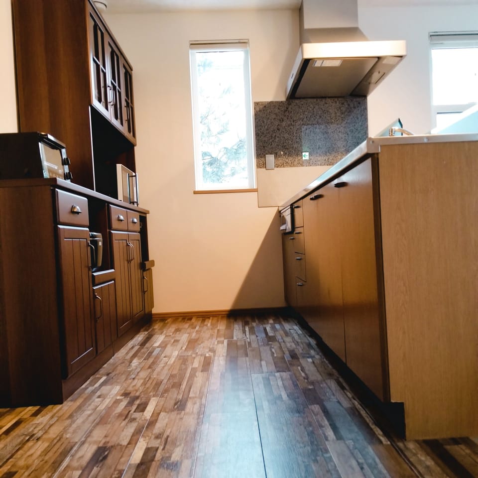 Holiday Home | Private kitchen | Full-size fridge, microwave, stovetop, coffee/tea maker