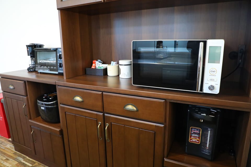 Holiday Home | Private kitchen | Full-size fridge, microwave, stovetop, coffee/tea maker
