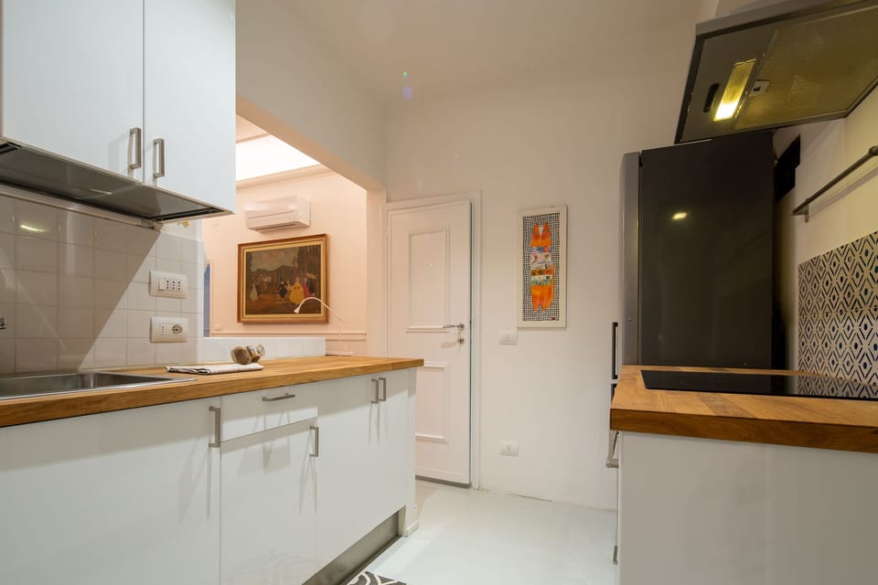 Design Apartment | Private kitchen | Full-size fridge, oven, stovetop, coffee grinder