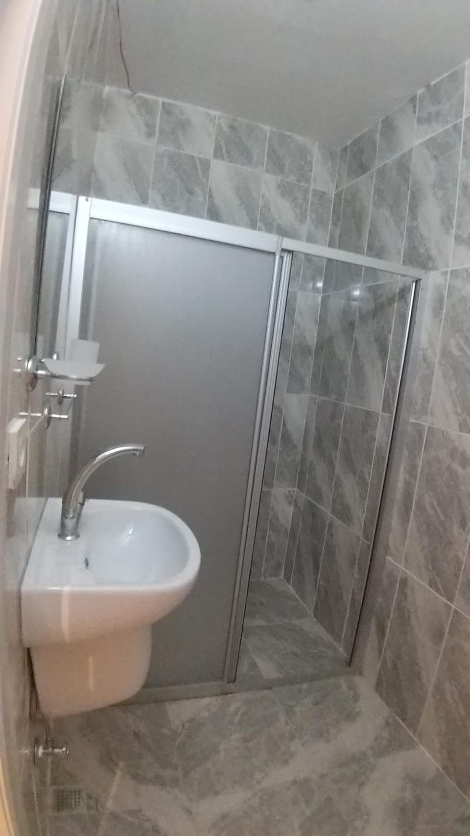 Hair dryer, slippers, towels, soap