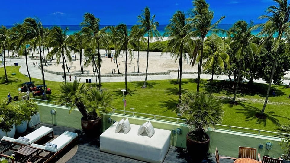 On the beach, sun loungers, beach towels