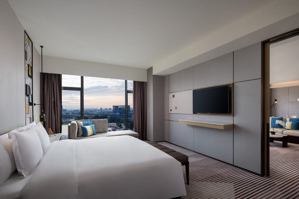 Suite, 1 Bedroom, Club Lounge Access, Lake View | Down comforters, minibar, in-room safe, individually decorated
