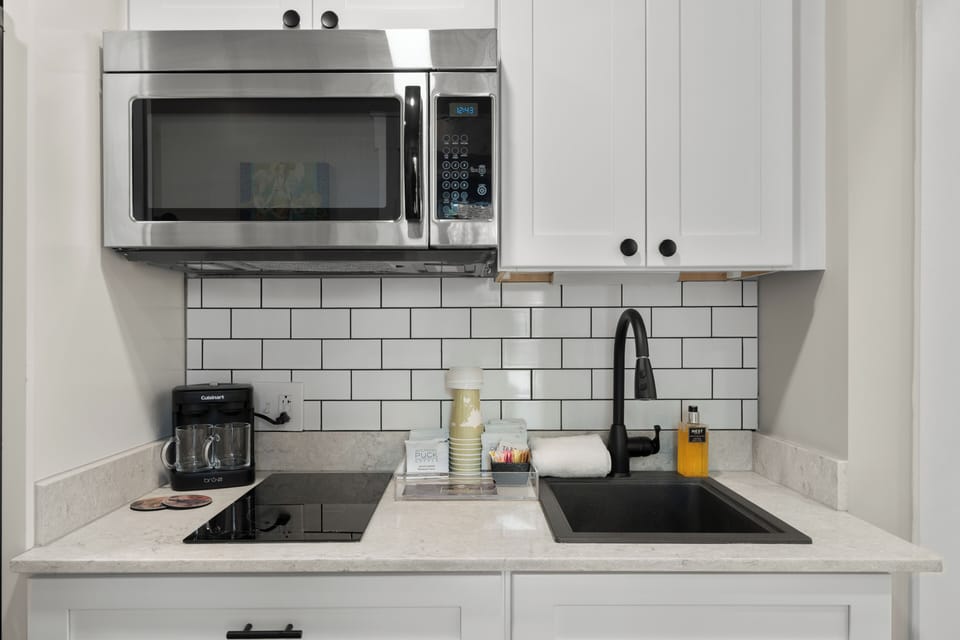 Family Studio Suite (No Elevator Access) | Private kitchen | Microwave, stovetop, toaster, cookware/dishes/utensils