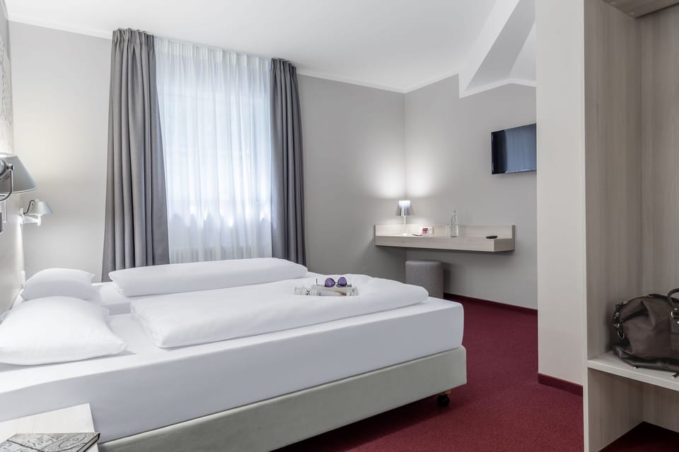 Hypo-allergenic bedding available, desk, blackout drapes, soundproofing