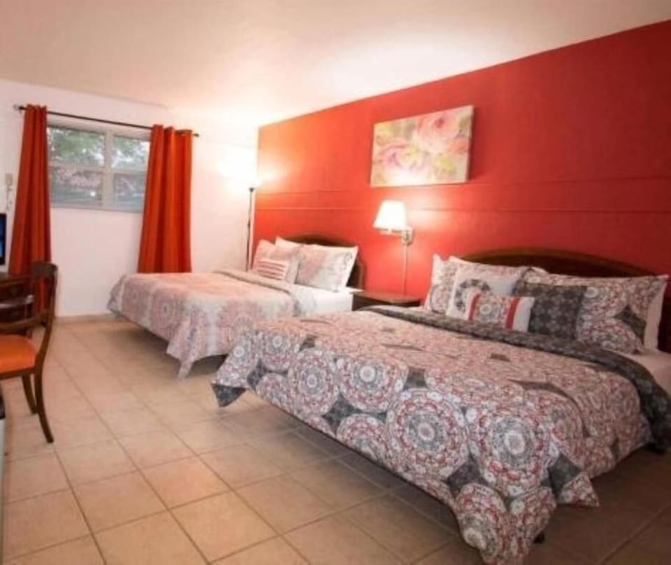 Classic Room, 2 Queen Beds, Non Smoking | Laptop workspace, blackout drapes, iron/ironing board, free WiFi