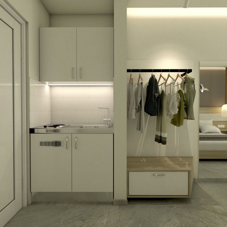 Suite, Pool View | Private kitchenette | Mini-fridge, stovetop, electric kettle, cookware/dishes/utensils