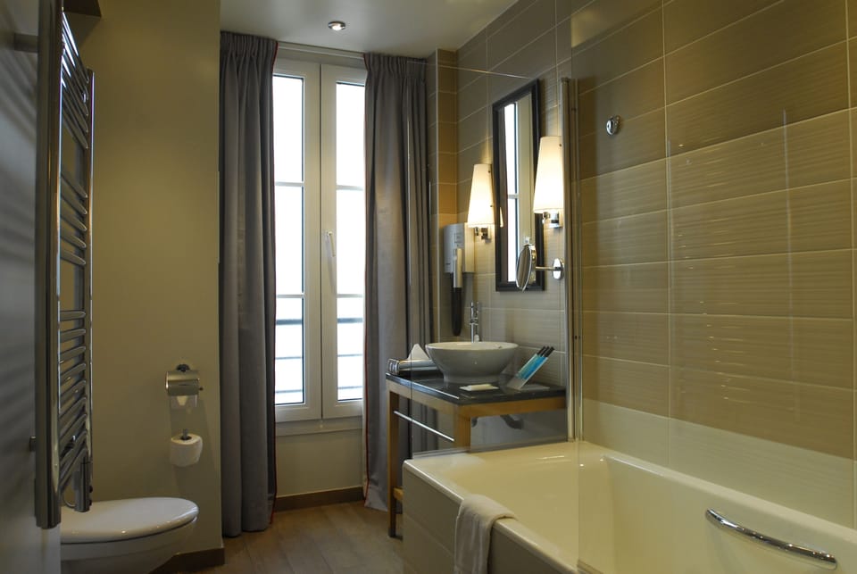 Superior Triple Room, Non Smoking | Bathroom | Hair dryer, slippers, towels