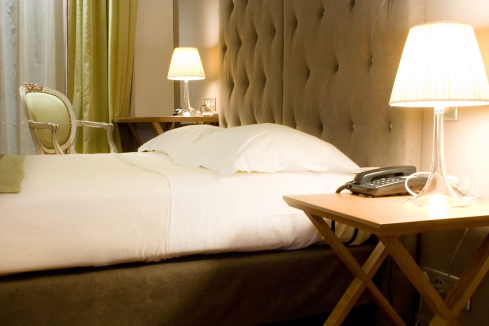 Junior Quadruple Room | Minibar, in-room safe, blackout drapes, soundproofing