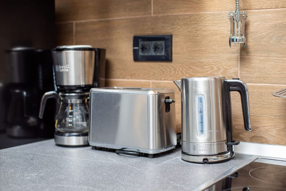 Apartment, 1 Bedroom, Balcony, City View | Coffee and/or coffee maker