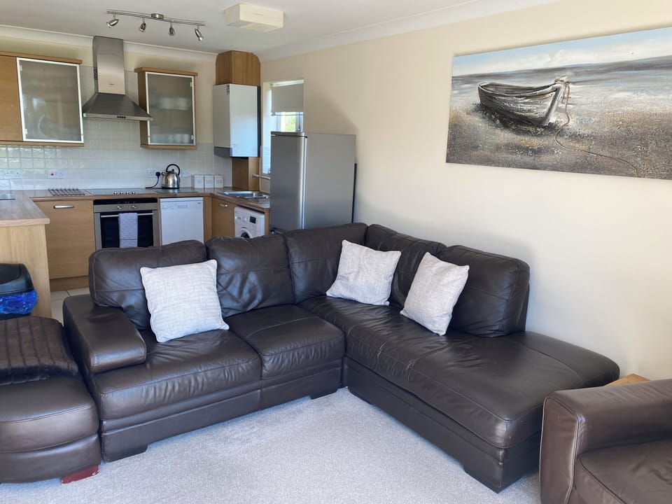Apartment, 2 Bedrooms, River View | Living area | TV