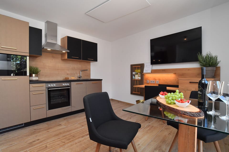 Superior Apartment (9) | Living area | 55-inch Smart TV with cable channels, TV