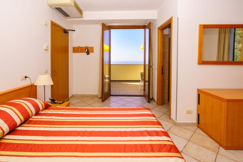 Double Room, Balcony | Down comforters, desk, blackout drapes, free WiFi