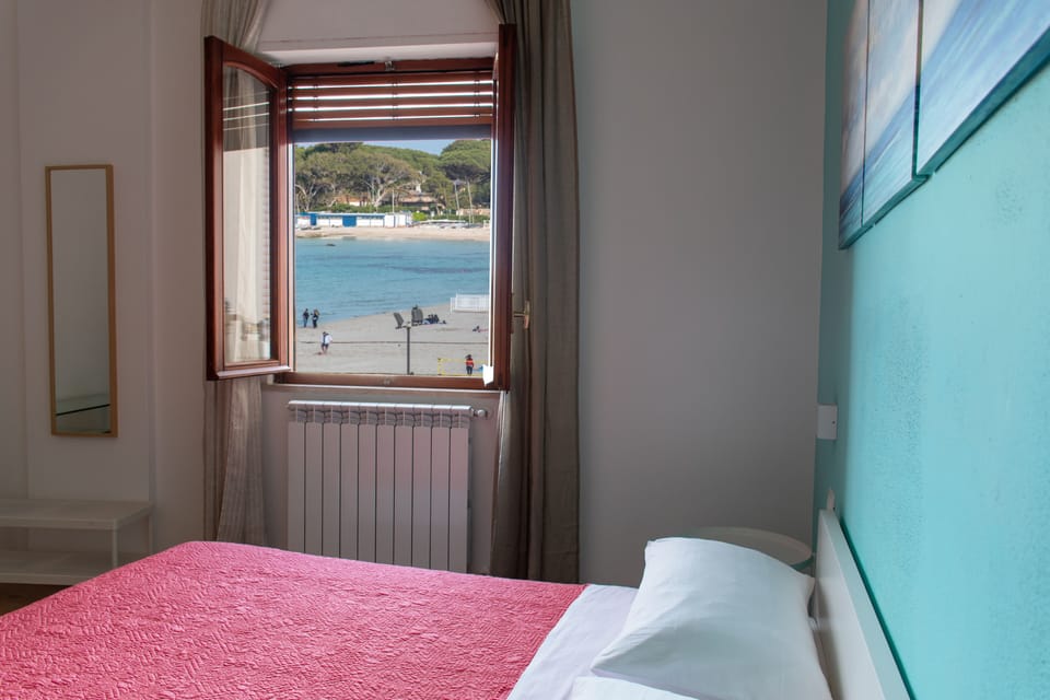 Deluxe Double Room, 1 King Bed, Beach View | Minibar, desk, free WiFi, bed sheets