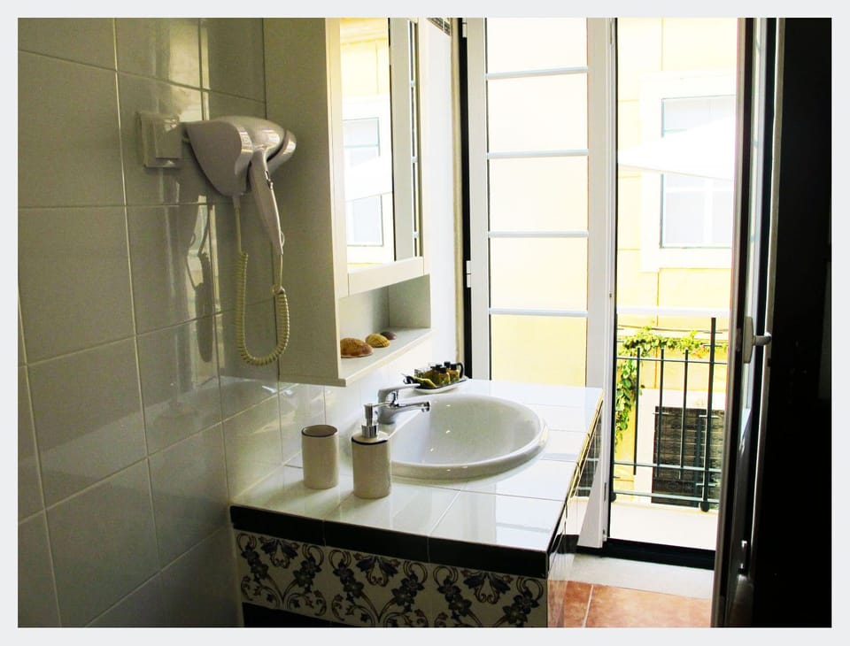 Romantic Double or Twin Room, Balcony | Bathroom | Shower, rainfall showerhead, designer toiletries, hair dryer
