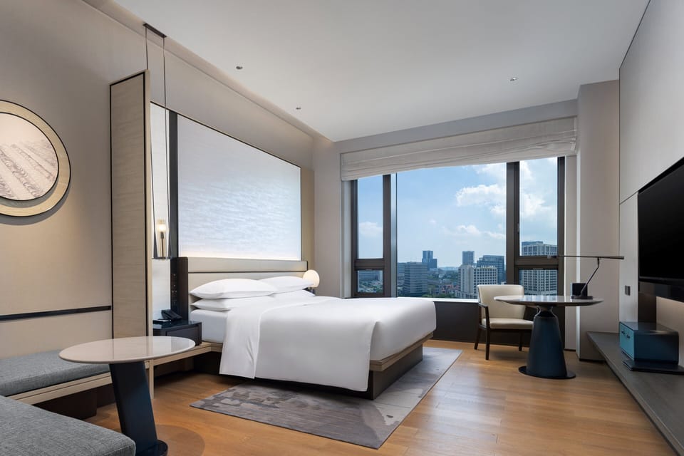 Premium bedding, down comforters, minibar, in-room safe