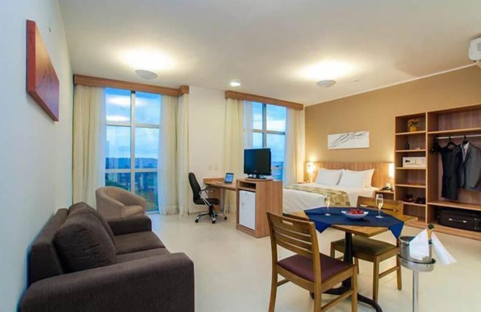 Suite Executiva | Living area | LCD TV