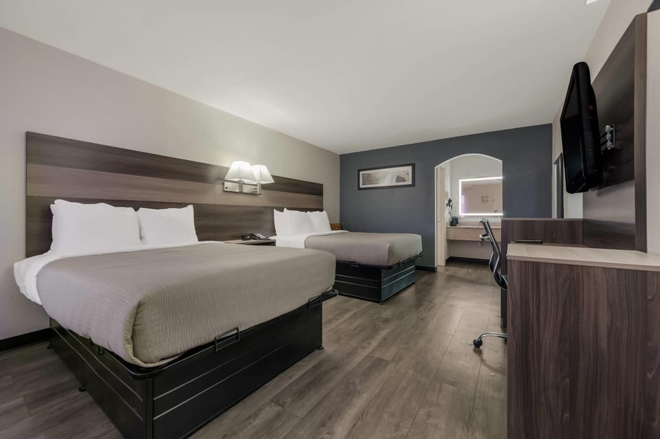 Standard Room, 2 Double Beds, Non Smoking | Blackout drapes, soundproofing, free WiFi, bed sheets